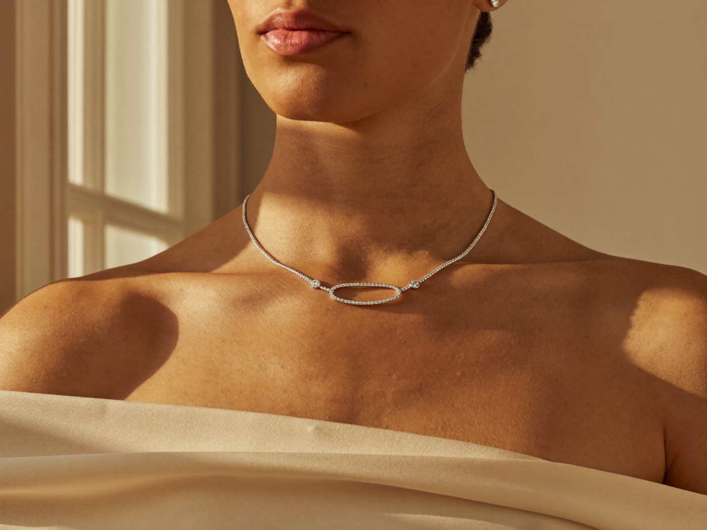 Model wearing a Novara diamond tennis necklace
